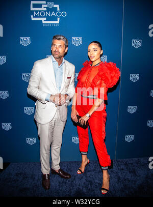 TAG Heuer feiert 50 Yerars von Ikonischen Modell Monaco mit Patrick Dempsey und Olivia Culpo Stockfoto