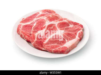 Rohe frische Schweinekamm Fleisch Steaks isoliert auf weißem Stockfoto