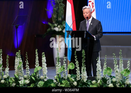 Luxemburg, AIIB in Luxemburg. 12. Juli, 2019. Jin Liqun, Präsident der Asiatischen Infrastruktur Investitionsbank (AIIB), bei der Rede während der Eröffnungszeremonie an der vierten jährlichen Sitzung des AIIB in Luxemburg, 12. Juli 2019. Das vierte Jahrestreffen des China-initiierte AIIB trat weg hier am Freitag zum ersten Mal außerhalb von Asien, Zeichnung über 1.000 AIIB Beamte, Vertreter der Mitglieder und Partner, Führungskräfte und Experten. Credit: Zhang Cheng/Xinhua/Alamy leben Nachrichten Stockfoto