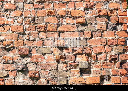 Hintergrund von einem gebrochenen Red brick wall Stockfoto