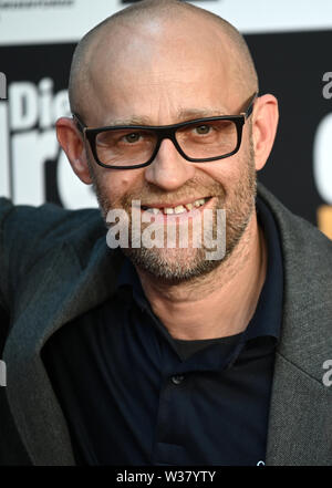 Köln, Deutschland. 13. Juli, 2019. Der Schauspieler Jürgen Vogel kommt zur Premiere der Film 'Die Drei!!!". Quelle: Henning Kaiser/dpa/Alamy leben Nachrichten Stockfoto