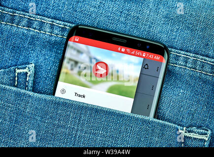 MONTREAL, KANADA - Dezember 23, 2018: Canada Post android app auf Samsung S8-Bildschirm. Canada Post ist eine Krone Corporation, die Funktionen wie die primäre Stockfoto