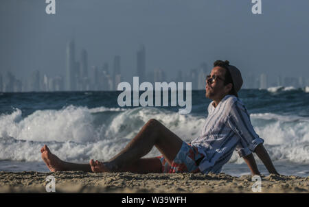 Australischen Strand Szenen. Das Leben ist ein Strand in Australien sun Backen in Queensland. Stockfoto