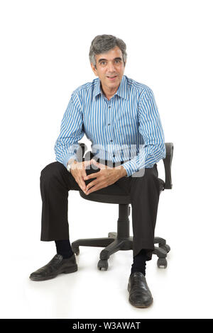 Geschäftsmann, sitzen in einem Bürostuhl Stockfoto