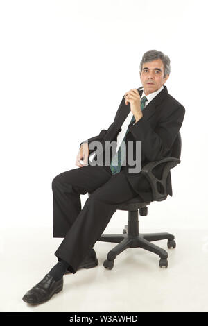 Geschäftsmann, sitzen in einem Bürostuhl Stockfoto