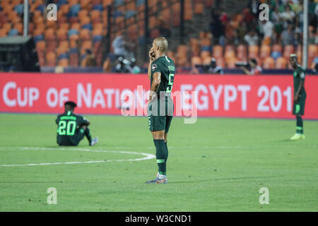 Kairo, Ägypten. 14. Juli, 2019. Nigeria Spieler angezeigt, nachdem das 2019 Afrika Cup Halbfinale Fußball Match zwischen Algerien und Nigeria im Cairo International Stadium niedergeschlagen. Credit: Oliver Weiken/dpa/Alamy leben Nachrichten Stockfoto