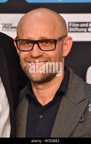 Köln, Deutschland. 13. Juli, 2019. Schauspieler Jürgen Vogel kommt zur Premiere des Films sterben Drei!!! (Drei Ausrufezeichen) Quelle: Horst Galuschka/dpa/Alamy leben Nachrichten Stockfoto