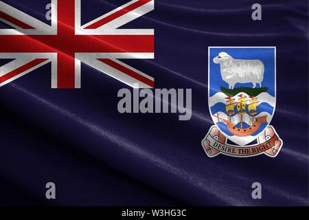 Realistische Flagge der Falklandinseln an den gewellten Oberfläche des Gewebes Stockfoto