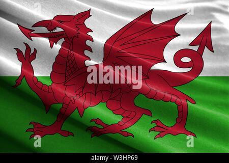 Realistische Flagge von Wales an den gewellten Oberfläche des Gewebes Stockfoto