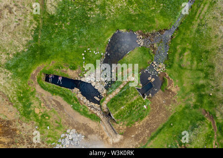 Antenne drone Ansicht von Hrunalaug hot spring, Fludir, Island Stockfoto