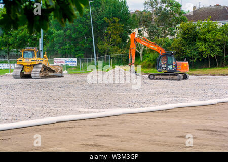 Grund für die Installation eines All-Wetter pitch Rugby Club vorbereitet wird. Stockfoto