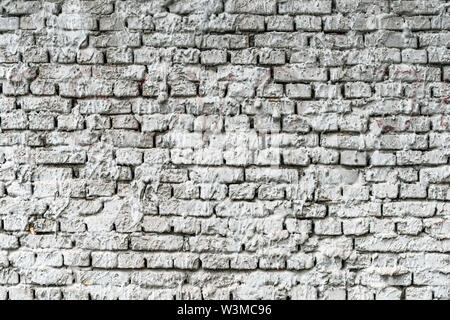 Mörtel besprühten Mauer Hintergrund, altes Haus Fassade Textur Stockfoto