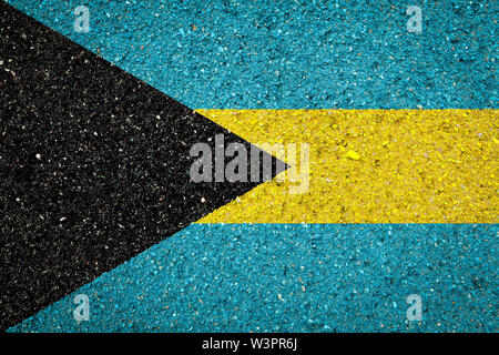 Flagge der Bahamas auf einem Stein Hintergrund. Das Konzept der nationalen Stolz und Symbol des Landes. Stockfoto
