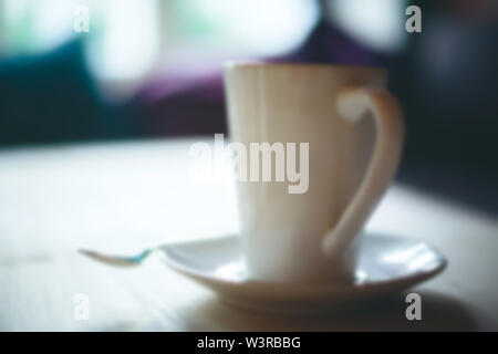 Verschwommenes Bild der Weißen Kaffeetasse, abstrakte essen Hintergrund Stockfoto