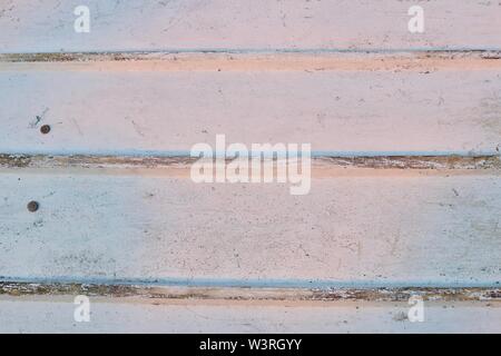 Unterseite eines alten weißen Holz Fischerboot in die untergehende Sonne Stockfoto