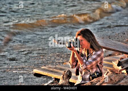 Fotograf Nyla James arbeitet sie an ihrem laufenden aufgegeben, Amerika, ihr eine Person Foto zeigen, in Clearlake California aktualisieren Bilder Stockfoto