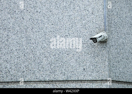 CCTV-Kamera an einer Wand Stockfoto