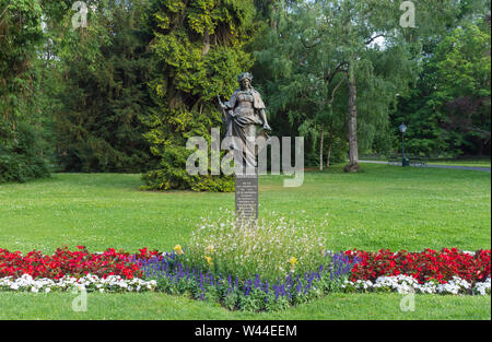 Statue, die Österreich im Stadtpark Stadtpark, eine grüne Insel in der Mitte der Stadt, in Graz, Steiermark, Österreich. Stockfoto