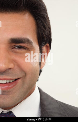 Porträt eines Geschäftsmannes lächelnd Stockfoto