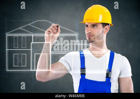 Junge Ingenieur zeichnen einen Plan für ein Haus Stockfoto