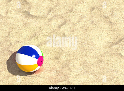 Ein beach ball am Strand an einem sonnigen Tag Stockfoto