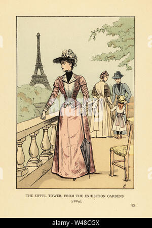 Der Eiffelturm aus der Ausstellung Gärten, 1889. Modische Frau in ausgestattet Jacke, schlankes Kleid, mit Hut und Sonnenschirm, in den Gärten der Exposition Universelle de 1889 Mit dem Eiffelturm im Hintergrund. Papierkörbe Lithographie von R.V. nach einer Abbildung von Francois Courboin von Octave Uzanne's Fashion in Paris, William Heinemann, London, 1898. Stockfoto