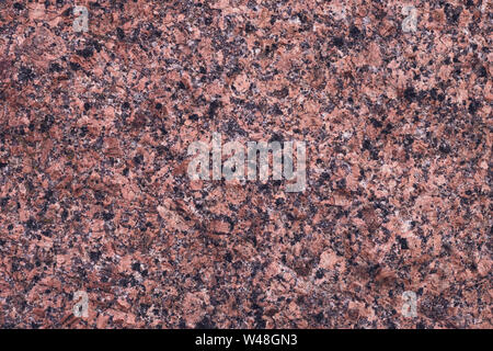 Moderne marmor granit Platte. Orange und Schwarz Textur, mineralische Muster. Grunge, Braun quartz Wall, Red Rock rauhe Oberfläche. Abstrakte unebenen Flecken unev Stockfoto