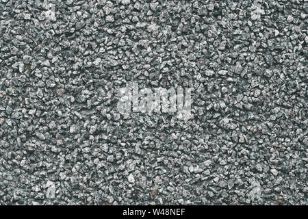 Grauen Stein Hintergrund. Abstrakte Muster von Kies. Natürliche Straße Textur. Rock Material. Grunge Stock auf die Straße. Stockfoto