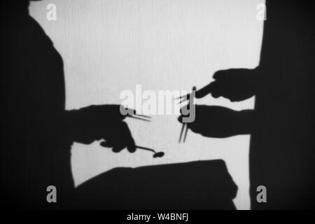 Schatten der Ärzte, die die Bedienung macht Stockfoto