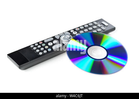 DVD, CD-ROM oder Blu-Ray Disc mit Tv oder dvd player Fernbedienung auf weißem Hintergrund. Home Theater Film oder Serie Konzept. Stockfoto