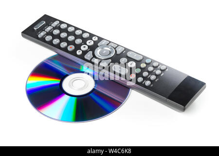 DVD, CD-ROM oder Blu-Ray Disc mit Tv oder dvd player Fernbedienung auf weißem Hintergrund. Home Theater Film oder Serie Konzept. Stockfoto