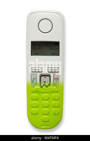 Bild von DECT-Telefon in ein Spielzeug Telefone auf weißem Hintergrund. Das Konzept der Technologieveralterung. Stockfoto