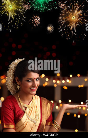 Frau, die das Diwali-Fest feiert Stockfoto