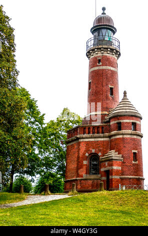 Der Holtenauer Leuchtturm am Eingang des Kiel-Holtenau Schloss ist einer der schönsten Leuchttürme in Deutschland. Stockfoto