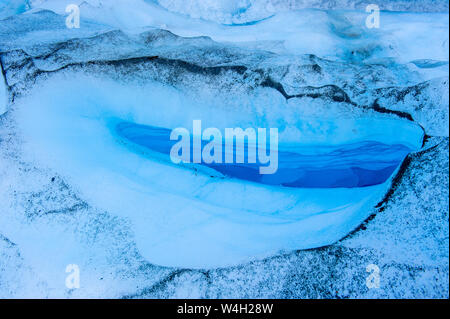 Großes Loch in das Eis des Fox Glacier, South Island, Neuseeland Stockfoto