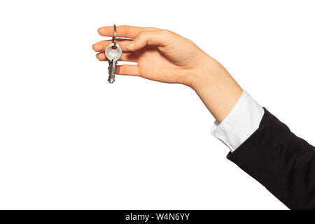 Woman's Hand metall Tür Schlüssel am Ring Stockfoto