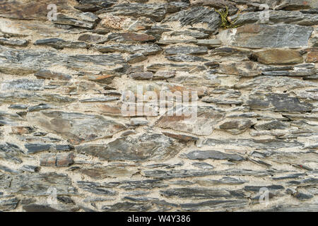 Trockenmauer im Detail als Hintergrund Stockfoto