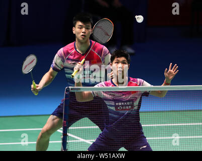 Tokio, Japan. 26. Juli, 2019. Wang Yilyu (1. L)/Huang Dongping China konkurrieren, während die gemischten Viertelfinale zwischen Wang Yilyu/Huang Dongping von China und Mark Lamsfuss/Isabel Herttrich Deutschlands bei den Japan Open 2019 Badminton Turnier in Tokio, Japan, 26. Juli 2019. Credit: Du Xiaoyi/Xinhua/Alamy leben Nachrichten Stockfoto