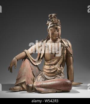 Guanyin Guanyin, Holz mit Resten von Malerei und Vergoldung. Guanyin ist in einer entspannten Position: Er hat ein Bein angehoben, der rechte Arm liegt lose auf es, Darstellungen, Götter, Halbgötter, Helden, etc. (traditionelle chinesische Religionen) usw. (Hinduismus, Buddhismus, Jainismus), Guan Yin, anonym, Shanxi, C. 1100-C. 1200, Liao - dynastie (907-1125) / Jin-Dynastie (1115-1234), Willow (Holz), Vergoldung (Material), Farbstoff, H 117,0 cm × w 111,0 cm × d 74,0 cm Stockfoto