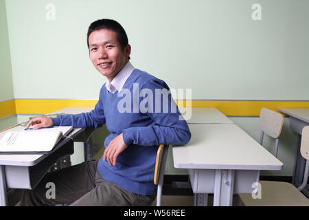 ---- Zhang Bangxin, Vorsitzender der TAL Bildung, posiert für ein Foto in Peking, China, 19. Oktober 2012. Eine Wertpapierfirma vereinbart zu zahlen Stockfoto