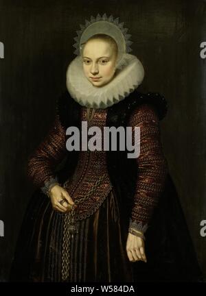 Portrait von Brechtje Overrijn van Schoterbosch, Portrait von Schoterbosch Brechtje van (1592-1618). Frau von dirck Hasselaer. Knie Stück, stehend, Halskette mit Anhänger in der rechten Hand., Cornelis Van Der Voort, 1614, Panel, Ölfarbe (Lack), Support: H 114,3 cm × w 82,9 cm, d 7,5 cm Stockfoto