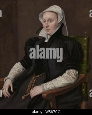 Porträts von Sir Thomas Gresham und Anne Fernely Portrait von Anne Fernely. Frau von Sir Thomas Gresham, Portrait von Anne Fernely (Lady Gresham), die Frau von Sir Thomas Gresham. In einem Stuhl sitzend, auf der linken Seite. Anne Fernely, Anthonis Mor, Antwerpen, C. 1560 - C. 1565, Leinwand, Ölfarbe (Lack), h 88 cm x W 75,5 cm Stockfoto