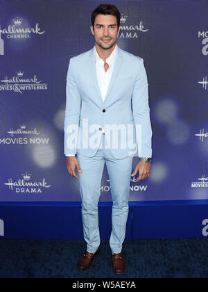 BEVERLY HILLS, LOS ANGELES, Kalifornien, USA - 26. Juli: Peter Porte kommt an der Hallmark Channel und Markenzeichen Filme und Geheimnisse Sommer 2019 TCA Presse Tour Veranstaltung in einem Privathaus am 26 Juli, 2019 in Beverly Hills, Los Angeles, Kalifornien, Vereinigte Staaten. (Foto von Xavier Collin/Image Press Agency) Stockfoto
