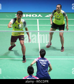 Tokio, Japan. 28. Juli 2019. Praveen Jordanien (1. L)/Melati Daeva Oktavianti (1. R) der Indonesien konkurrieren im gemischten Doppel Finale gegen Wang Yilyu/Huang Dongping von China an Japan Open 2019 Badminton Turnier in Tokio, Japan, am 28. Juli 2019. Wang Yilyu/Huang Dongping gewann 2-0. Credit: Du Xiaoyi/Xinhua/Alamy leben Nachrichten Stockfoto