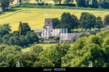 Guiting Power, Cheltenham, Gloucestershire, England, UK. Eine Übersicht über St Michaels und alle Engel Kirche Guiting macht ein kleines Dorf Stockfoto