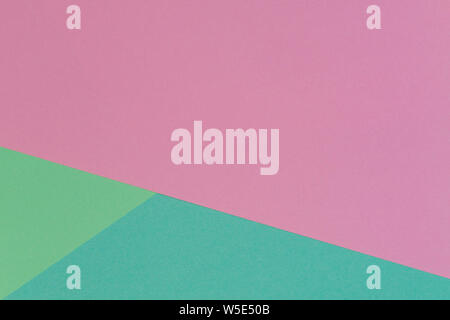 Pastell rosa und Hellgrün Papier Textur Hintergrund. Abstrakte geometrische Papier Hintergrund mit trendigen Farben Stockfoto