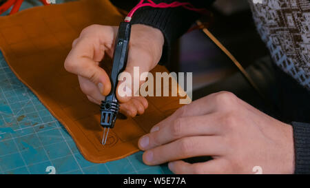 Skinner, dekorative Details auf Leder Wettbewerbsbedingungen Stockfoto