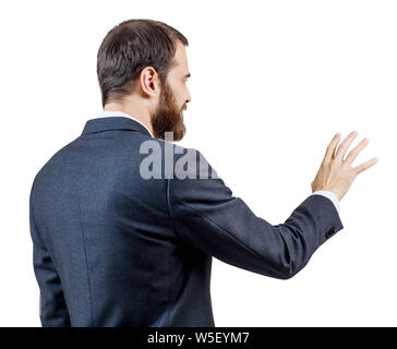 Geschäftsmann in Anzug zeigt ausgestreckte Hand mit gespreizten Fingern. Stockfoto