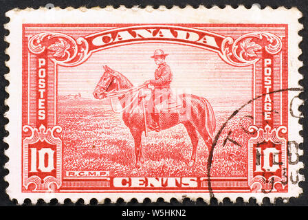 Royal Canadian Mounted Polizist auf vintage Stempel Stockfoto