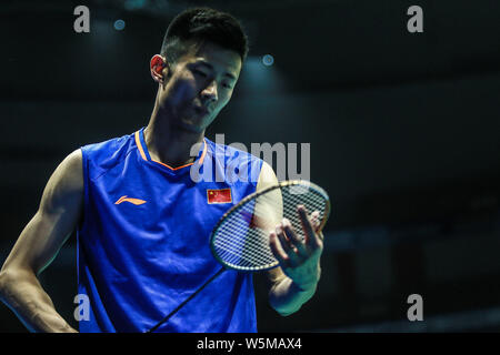 Chen Lange von China reagiert, während gegen Kanta Tsuneyama von Japan konkurrieren in der ersten Runde der Herren Einzeln während der 2019 Badminton Asien C Stockfoto